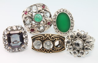 An Indian silver gem set dress ring and 4 others