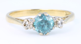 An 18ct yellow gold blue zircon and diamond ring size N 