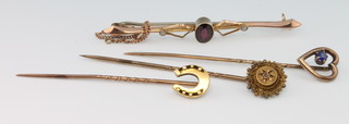 A 9ct yellow gold garnet and pearl bar brooch and 3 Edwardian tie pins