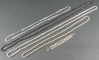 A cultured pearl necklace and a quantity of others