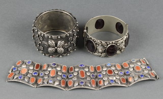 Three foreign silver bangles