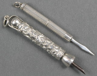 An Edwardian silver cigar piercer and a silver toothpick