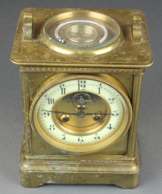 A 19th Century French 8 day striking mantel clock with enamelled dial and Arabic numerals, visible escapement, contained in a gilt metal case, the top inset a compass and thermometer with silvered dial 