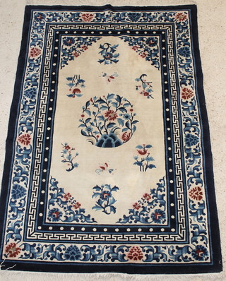 A 1930's blue and white Chinese rug 72" x 48" 