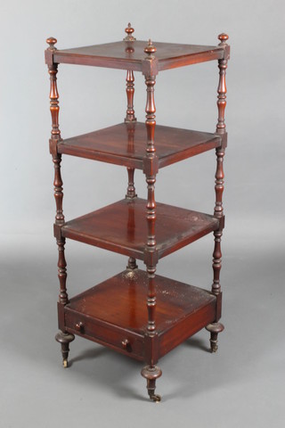 A Regency mahogany 4 tier square what-not with turned supports and base drawer, raised on turned legs with brass caps and casters 51"h x 18 1/2"d 