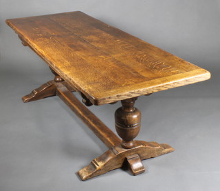 An Antique style oak refectory table, the 4 plank top raised on bulbous baluster supports with H shape stretcher 50"h x 84"l x 32"d 