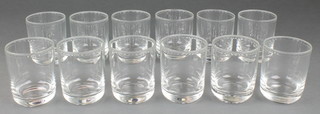 A set of 12 Orrefors stylish Selter glasses with faceted rims