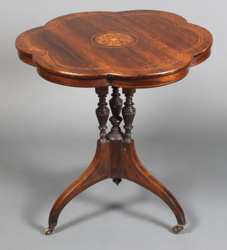 A Victorian circular inlaid rosewood occasional table, raised on turned column and tripod base 27"h x 36" diam. 
