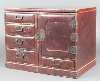 A 19th Century Japanese red lacquered table top cabinet decorated birds in branches, having a sliding top, fitted 4 long drawers, the interior fitted 2 short drawers enclosed by a cupboard with drawer beneath 11"h x 14"w x 10"d