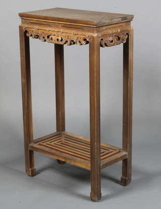 A rectangular Chinese hardwood 2 tier occasional table with carved apron 33"h x 19"w x 10 1/2"d 