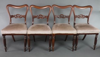 A set of 4 Victorian mahogany buckle back dining chairs with over stuffed seats, upholstered in mushroom coloured velour 