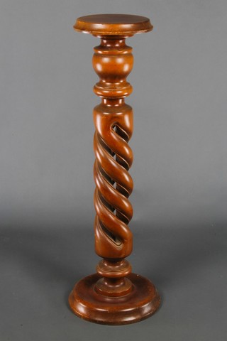 A spiral turned mahogany torchere 38"h x 10" diam. 