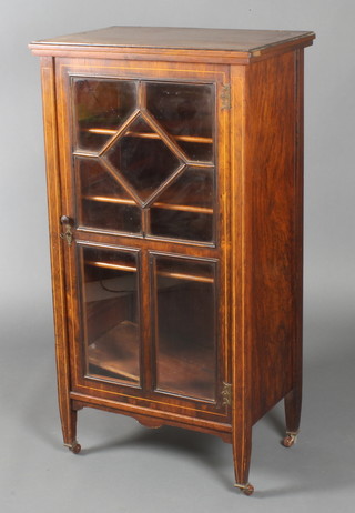 An Edwardian Victorian inlaid mahogany music cabinet, fitted shelves enclosed by astragal glazed panelled door, raised on square tapered supports 41"h x 22"w x 15"d 