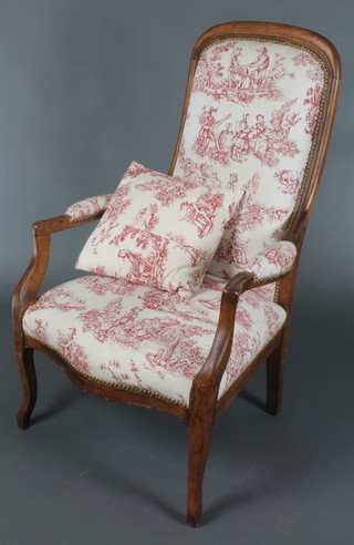 A Victorian mahogany show frame open arm chair upholstered in red and white patterned material, raised on cabriole supports 