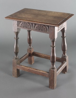 A Victorian rectangular oak joint stool with carved apron 20"h x 18"w x 11"d 