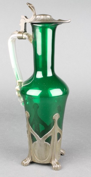An Art Nouveau green glass ewer with stylish pewter mounts 11 1/2" 