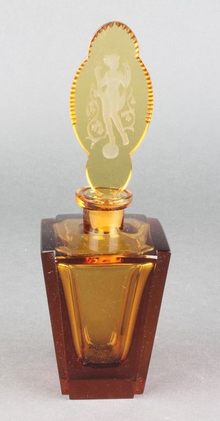An Art Deco amber glass tapered scent with intaglio stopper in the for of a naked lady 8"