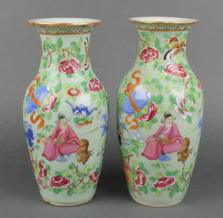 A pair of 19th Century Celadon oviform vases, later decorated with scrolling flowers, insects and trees 9" 