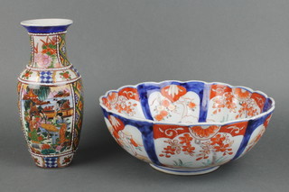 A late 19th Century Imari fluted bowl with panels of flowers 9 1/2", a modern Chinese oviform vase 8" 
