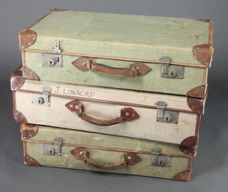 2 green fibre and leather bound suitcases marked Pendragon 1957 7" x 26" x 15" and 1 other 8" x 28" x 16" 