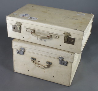 A parchment suitcase with chrome mounts 12"h x 20"w x 18"d (slight corrosion to handle and locks) and 1 other suitcase 7"h x 24"w x 15"d (some scuffing) 
