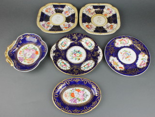 A 19th Century English oval sauceboat stand the blue and gilt ground with flowers  8", an ensuite scalloped dish and 4 plates