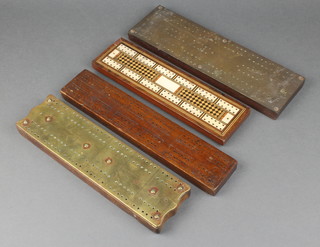 2 brass cribbage boards, an inlaid mahogany and bone cribbage board (small section missing) and a wooden cribbage board