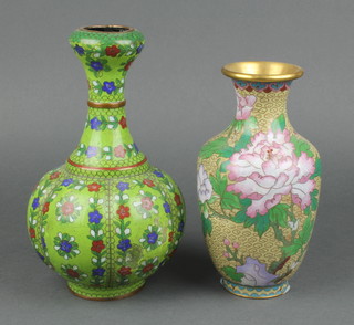 A 19th/20th Century green ground club shaped cloisonne enamelled vase with floral decoration 9" (dented) together with a club shaped cloisonne vase with floral decoration 8" 