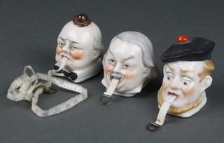 Three early 20th Century Continental porcelain novelty tape measures in the form of Churchill, Lloyd George and a Scotsman