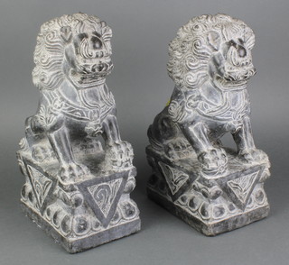 A pair of Chinese carved granite figures of Dogs of Fo 12" 