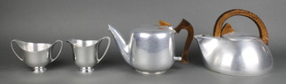 A 3 piece Picquot ware tea service, a ditto Aga kettle and a pair of beech shoe trees 