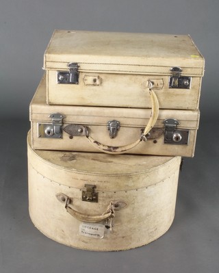 A parchment hat box marked Makers Birmingham 11 Old Street SW1 11"h x 20"w x 19"d, a parchment suitcase with chrome mounts 6"h x 20"w x 14"d (handle corroded), 1 other parchment suitcase (handle f) 6"h x 18"w x 13"d 