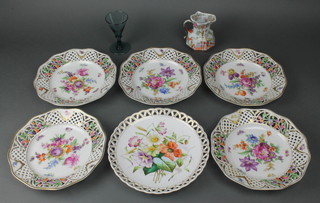 Five early 20th Century Continental porcelain dessert plates with spring flowers and pierced borders 8", one other,  an Ironstone jug and a cordial