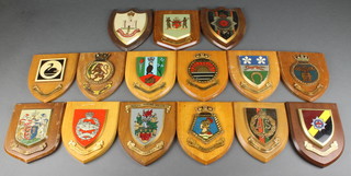 15 various Regimental painted wall plaques