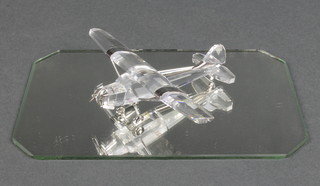 A Swarovski model of an aeroplane 3" with mirrored base and box