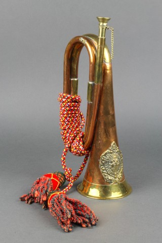 A reproduction copper and brass bugle decorated the badge of the Argyle & Sutherland Highlanders
