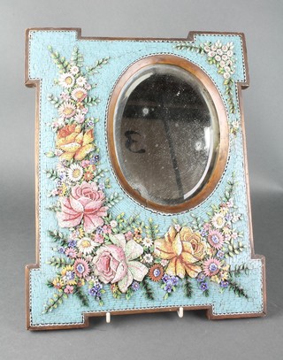 A Victorian oval bevelled plate wall mirror contained in a micro mosaic Oxford shaped frame 15" x 11 1/2" 