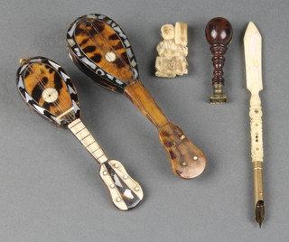 2 tortoiseshell and mother of pearl mounted miniature mandolins 5" and 4 1/2", an ivory dip pen, a small carved ivory figure and a seal 
