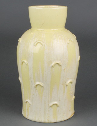 An early 20th Century English studio pottery baluster vase with yellow slip glaze 10"