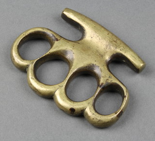 A brass knuckle duster