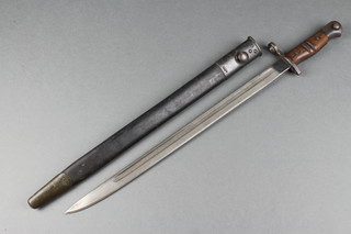 A 1913 Remington bayonet complete with scabbard 
