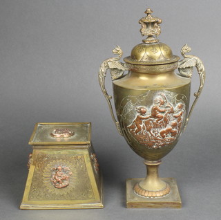 A waisted brass and copper mounted trinket box with hinged lid 3"h x 4"w x 4"d together with a ditto twin handled urn 10" 
