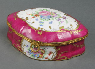 A Limoges gilt metal mounted serpentine trinket box the burgundy ground with spring flowers 7 1/2"