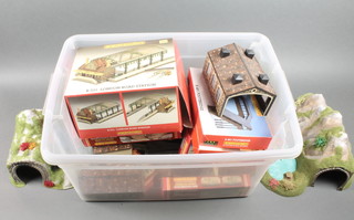 A Hornby R331 London Road Station boxed, ditto R559 Country Church Kit, ditto R481 foot bridge and other railway buildings and tunnels 