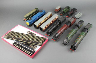 A Hornby OO gauge electric locomotive Duchess of Montrose, ditto Silver King and tender, ditto Duchess of Atholl, ditto locomotive and tender, a Hornby type L17 tank engine, a Southern Railways tank engine, a Triang R351 double headed diesel  locomotive, 1 other diesel locomotive, 2 items of rolling stock and 2 carriages together with a collection of various rails 
