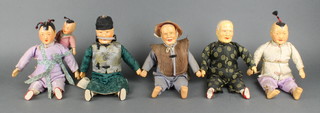 5 various painted wooden Chinese dolls 9 1/2"