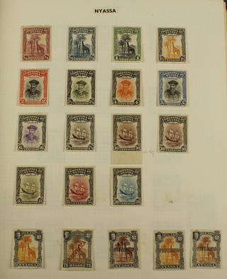 An album of World stamps including Northern Ingermanland, Nyassa, Nyassa Company, Obock, Oman, Egypt OCC of Palestine, Panama, Papal States, Paraguay