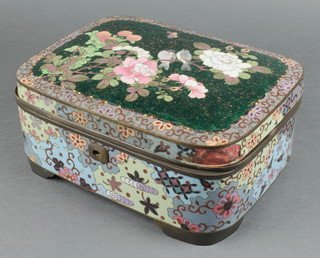 A 19th Century green ground cloisonne enamelled box and cover with hinged lid, the lid decorated birds amidst flowering branches 