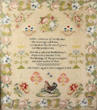 A Victorian stitchwork sampler with motto and floral decoration by Ada Taylor aged 8 years August 31st 1862 21" x 18 1/2" contained in a decorative gilt frame 