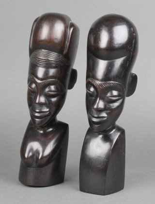 A pair of African carved ebony portrait busts of a lady and gentleman 10" 